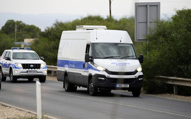 The police van carrying the five Israelis who are accused of raping a British woman, arrives at the Famagusta District Courthouse in Paralimni, Cyprus, on September 12, 2023. (AP Photo/Petros Karadjias)