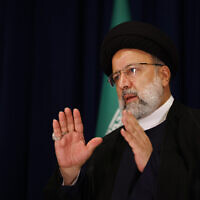 Iran's President Ebrahim Raisi departs after holding a news conference, in New York, September 20, 2023. (Jason DeCrow/AP)