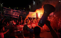 Israelis protest against plans by Prime Minister Benjamin Netanyahu's government to overhaul the judicial system in Tel Aviv, Israel, Saturday, Sept. 23, 2023. (AP/Ariel Schalit)