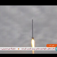 This frame grab from video aired by Iranian state television on Sept. 27, 2023, shows what Iran's Communication Minister Isa Zarepour said is a Noor-3 satellite being launched from an undisclosed location in Iran. (IRIB via AP)