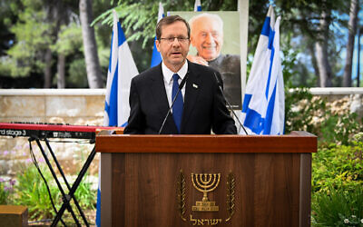 President Isaac Herzog at a memorial ceremony for late president Shimon Peres, at the Mount Herzl cemetery in Jerusalem, on September 6, 2023. (Arie Leib Abrams/Flash90)
