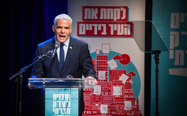Yesh Atid chairman Yair Lapid speaks during a conference in Tel Aviv on September 10, 2023. (Flash90)