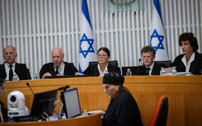 Supreme Court President Esther Hayut and other justices at a High Court hearing on the 'reasonableness law,' at the Supreme Court in Jerusalem, September 12, 2023. Judge Noam Sohlberg is at left. (Yonatan Sindel/Flash90)
