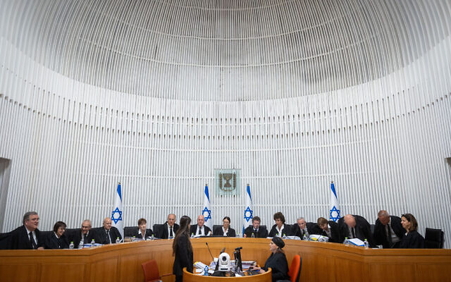 The 15 justices on the High Court attend a hearing on petitions against the government's reasonableness law, at the Supreme Court in Jerusalem, September 12, 2023. (Yonatan Sindel/FLASH90)