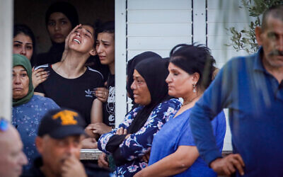 People react at the scene where five family members were shot to death in the northern Israeli Bedouin town of Basmat Tab’un, September 27, 2023 (Shir Torem/Flash90)