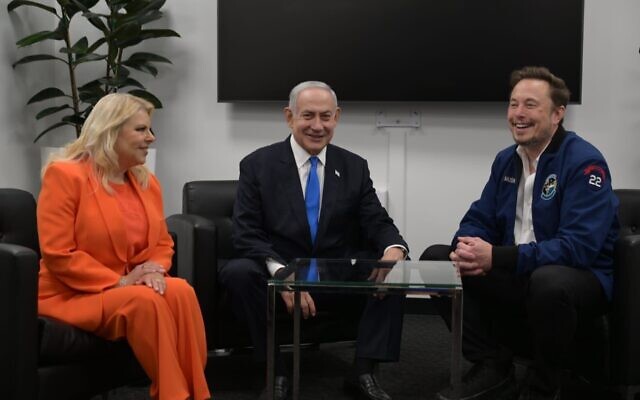 This handout photo shows Prime Minister Benjamin Netanyahu and his wife Sara meeting with Tesla owner Elon Musk at the electric car company's factory in Fremont, California, September 18, 2023. (Avi Ohayon/GPO)