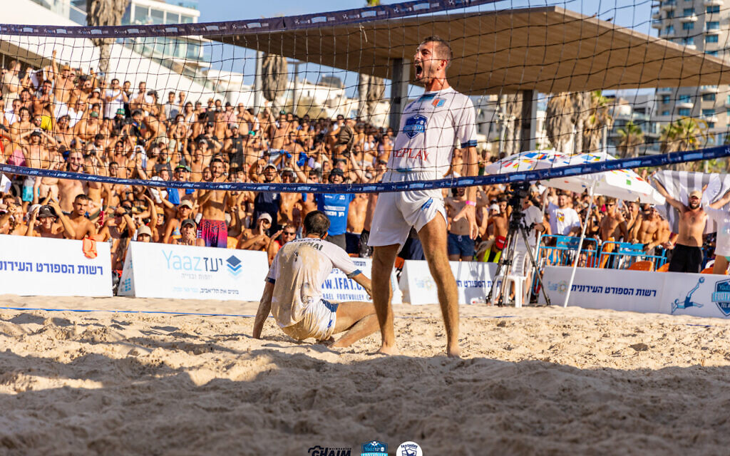 Maor Haas celebrates after scoring a point at the footvolley Final Four League Championship on August 5, 2023, at Frishman Beach in Tel Aviv. (Chaim Weingarten)