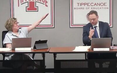 Tipp City Board of Education member Anne Zakkour delivers a Nazi salute and utters "Sieg Heil" at board then-president Simon Patry during a public meeting, Sept. 5, 2023. (Screenshot via Tipp City Board of Education via JTA)