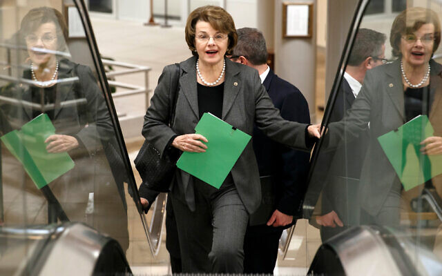 US Sen. Dianne Feinstein heads to the chamber to advance a bill providing $1 billion in loan guarantees to Ukraine as then president Barack Obama meets with US allies in Europe to punish Moscow for its annexation of the Crimean peninsula, at the Capitol in Washington, March 24, 2014. (AP Photo/J. Scott Applewhite, File)