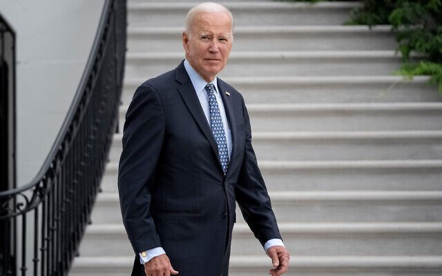 US President Joe Biden walks out of the White House to board Marine One on the South Lawn in Washington, September 17, 2023. (AP Photo/Andrew Harnik)