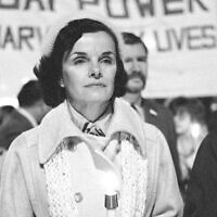 Then San Francisco Mayor Dianne Feinstein carries a candle as she leads an estimated 15,000 marchers also carrying candles during a procession in memory of slain Mayor George Moscone and Supervisor Harvey Milk in San Francisco, November 28, 1979. (AP Photo/Paul Sakuma, File)