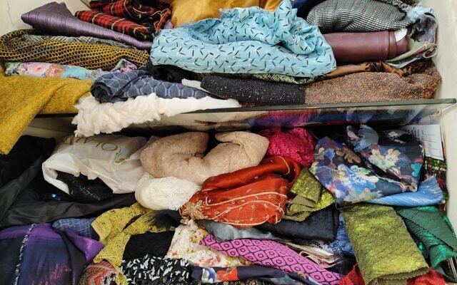 A selection of raw fabrics of different kinds, which will be used to fashion custom hats and head coverings for religious Jewish women, at Dalia's Hats in Tel Aviv. (Gavriel Fiske/Times of Israel)