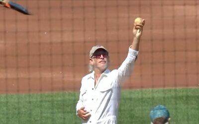 Rapper Matisyahu holds up a matzah ball ahead of the opening pitch at a New York Mets game at Citi Field on September 3, 2023. (Video screenshot used in accordance with clause 27a of the copyright law)