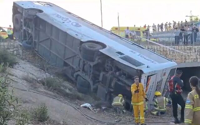 A bus that rolled off a road near Beit Shemesh on September 27, 2023. (Screen capture: TPS)