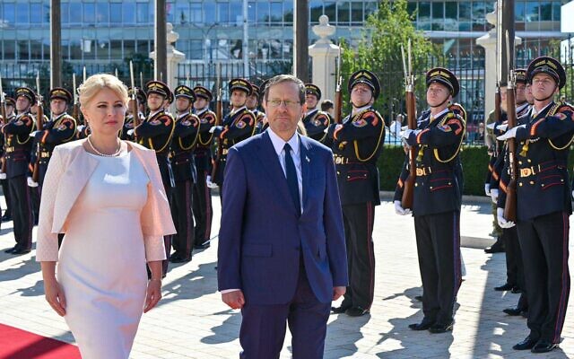 President Isaac Herzog is received at the presidential palace in Bratislava, Slovakia, alongside President Zuzana Caputova, September 4. 2023 (Courtesy)