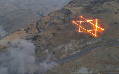 Charges shaped like a Star of David are detonated in a controlled explosion to clear rocks in the Golan Heights on August 29, 2023 (Screencapture/ Channel 12: used in accordance with Clause 27a of the Copyright Law)