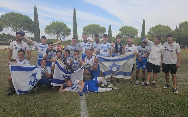 The Israeli under-17 flag football team poses for photo after winning first place in European championship on Sunday, September 3, 2023. (Courtesy)