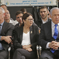 File: Prime Minister Benjamin Netanyahu (R), President of the Supreme Court Esther Hayut (C) and Benny Gantz (L), then-leader of the Blue and White party, attend a memorial ceremony for late president Shimon Peres, at Mount Herzl in Jerusalem on September 19, 2019. (Gil Cohen-Magen/AFP)