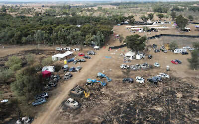 An aerial picture from October 10, 2023, shows the abandoned site of the October 7, 2023, assault by Hamas terrorists on the Supernova music festival near Kibbutz Re'im in the Negev desert, southern Israel. Some 360 people were slaughtered at the outdoor event, among 1,200 people murdered by the terrorists that day in southern Israel. (Jack Guez/AFP)