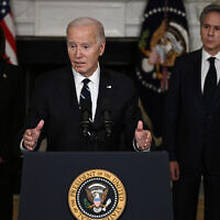 US President Joe Biden, with Vice President Kamala Harris (L) and Secretary of State Antony Blinken (R), speaks about the Hamas atrocities against Israelis, and pledges unstinting support for Israel, in the State Dining Room of the White Houses in Washington, DC, on October 10, 2023. (Brendan SMIALOWSKI / AFP)