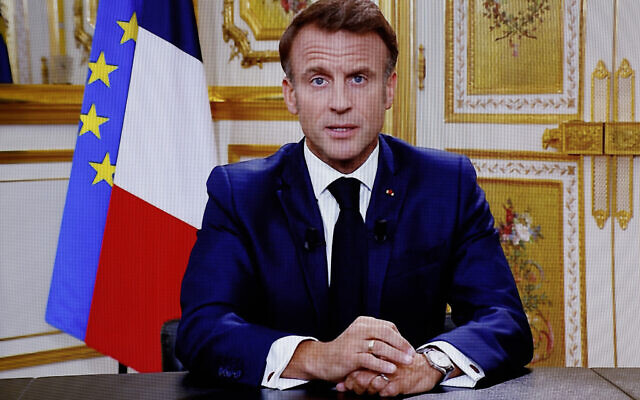 French President Emmanuel Macron during a televised address to the nation on the topic of the conflict between Israel and Palestinian terror group Hamas, made from the Elysee Palace, in Paris, on October 12, 2023. (Ludovic Marin/AFP)