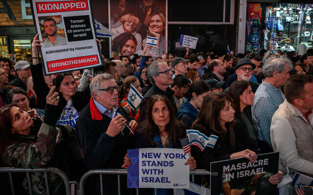 Members of the Jewish community and supporters of Israel attend a rally calling for the release of hostages held by the Gaza-ruling Hamas terror group, in Times Square, New York on October 19, 2023. (Ed Jones/AFP)