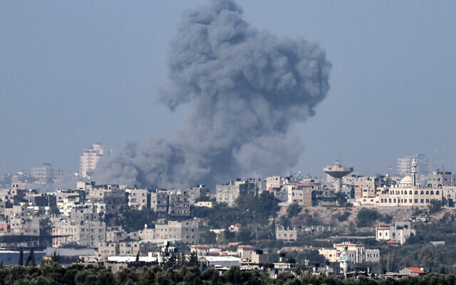 This picture taken from Sderot shows smoke billowing over the northern Gaza Strip on October 19, 2023. (Jack Guez/AFP)