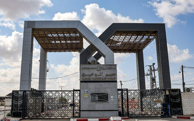 This picture taken on October 19, 2023 shows the closed gate to the Rafah border crossing with Egypt, in the southern Gaza Strip. (Mohammed Abed/AFP)
