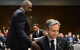 Defense Secretary Lloyd Austin (left) greets US Secretary of State Antony Blinken while arriving to testify during a Senate Appropriations Committee hearing to examine the national security supplemental request, on Capitol Hill in Washington, DC, on October 31, 2023. (SAUL LOEB / AFP)