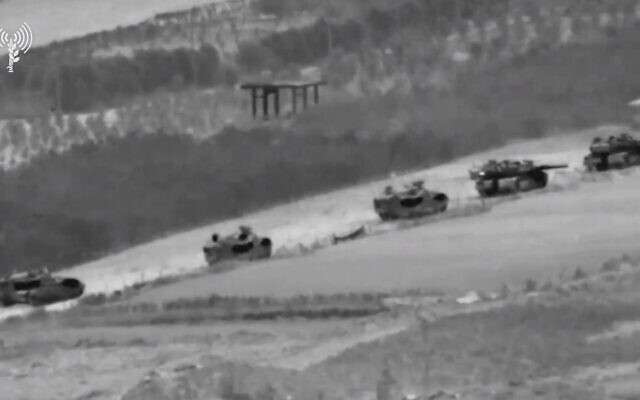 A still from video released by the IDF shows Israeli tanks rolling into Gaza on October 27, 2023. (Screen capture: IDF)