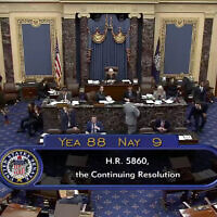 This image from U.S. Senate video shows the vote total, 88-9, on a temporary funding bill in the Senate at the US Capitol in Washington, Saturday, September 30, 2023. (Senate Television via AP)