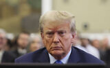 Former President Donald Trump sits in the courtroom at New York Supreme Court, Monday, October 2, 2023, in New York.  (Brendan McDermid/Pool Photo via AP)