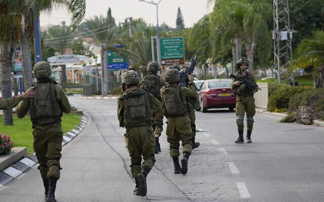 Israeli soldiers deploy in Sderot, Israel, on October 7, 2023. (AP Photo/Ohad Zwigenberg)