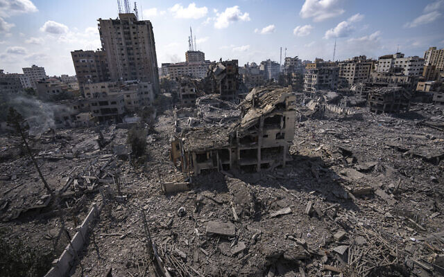 A view of the rubble of buildings hit by an Israeli airstrike, in Gaza City, October 10, 2023. (Fatima Shbair/AP)