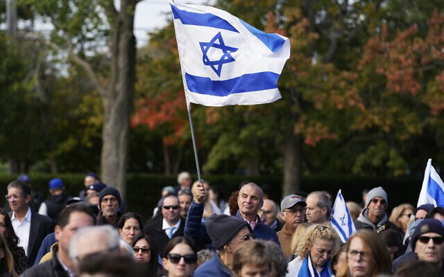 Supporters of Israel attend a solidarity event in Glencoe, Illinois, Tuesday, Oct. 10, 2023 (AP Photo/Nam Y. Huh)