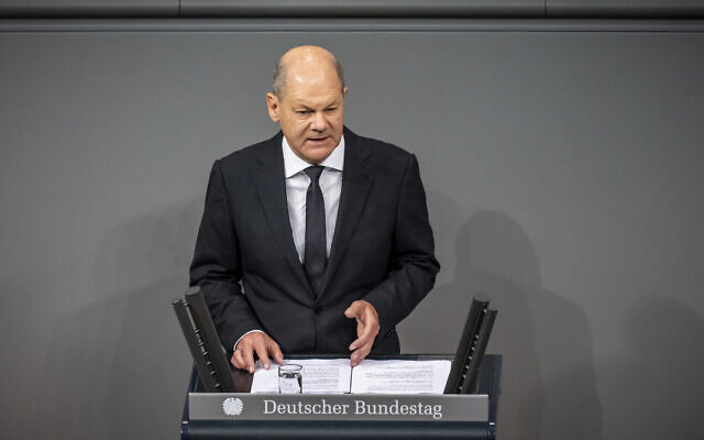 German Chancellor Olaf Scholz delivers a government statement on the situation in Israel during a meeting of the German federal parliament, Bundestag, at the Reichstag building in Berlin, Germany, Oct. 12, 2023. (Michael Kappeler/dpa via AP)
