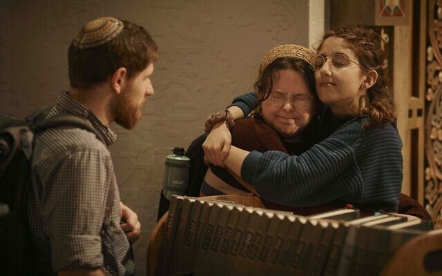 Jews hug after a communal prayer to honor and offer support for the victims in Israel at B'nai Jeshurun Synagogue on Thursday, Oct. 12, 2023, in New York. (Andres Kudacki/AP)