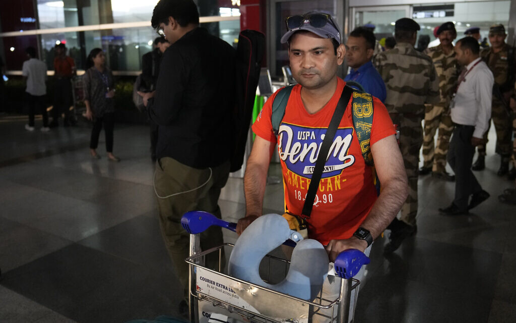 An Indian student evacuated from Israel arrives at Delhi airport, in New Delhi, India, Friday, Oct. 13, 2023. (AP/Manish Swarup)