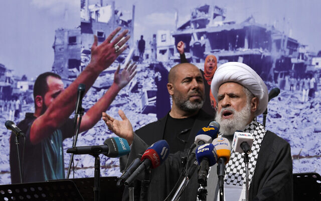 Sheik Naim Qassem, Hezbollah's deputy leader addresses a speech during a protest to show their solidarity with the Palestinians, in the southern suburb of Beirut, Lebanon, October 13, 2023.  (AP Photo/Hussein Malla)