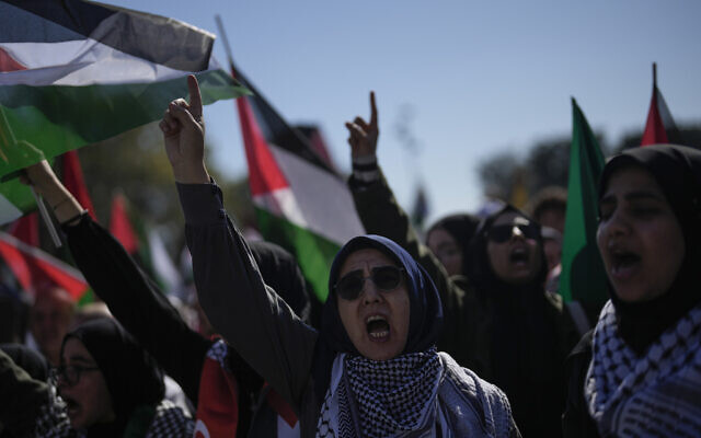 Protesters take part in a solidarity protest with the Palestinians, in Istanbul, Oct. 13, 2023. (AP Photo/Khalil Hamra)