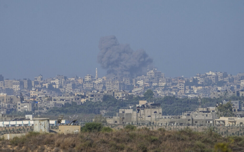 Smoke rises following an Israeli airstrike in the Gaza Strip, as seen from southern Israel, Oct. 15, 2023 (AP Photo/Ariel Schalit)