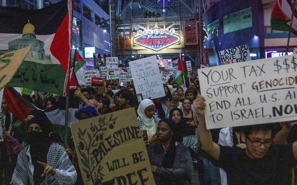 Pro-Palestinian protesters march and denounce Israel in Las Vegas, Tuesday, October 17, 2023 (AP Photo/ Ty ONeil)