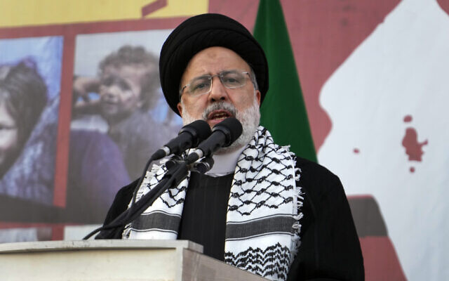 Iranian President Ebrahim Raisi speaks during an anti-Israel rally at Enqelab-e-Eslami (Islamic Revolution) Sq. in Tehran, Iran, Wednesday, Oct. 18, 2023. (AP Photo/Vahid Salemi)