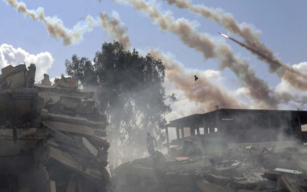 Rockets are fired from the Gaza Strip toward Israel, Oct. 19, 2023. (AP Photo/Mohammed Dahman)
