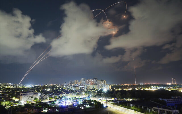 The Iron Dome air defense system fires to intercept a rocket fired from the Gaza Strip, in Ashkelon, Oct. 19, 2023. (AP Photo/Tsafrir Abayov)