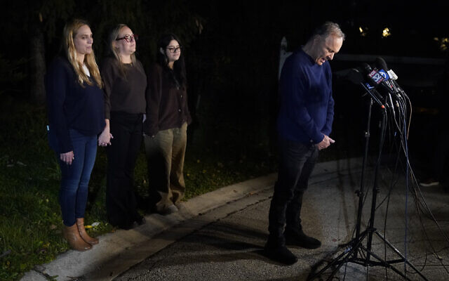 Uri Raanan, right, pauses as he talks to reporters outside his Bannockburn, Illinois, home with his sister Sigal Zamir, left, wife Paola Raanan, center, and her daughter Frida Alonso, after his daughter Natalie, and her mother Judith Raanan were released by Hamas, Friday, Oct. 20, 2023. (AP/Charles Rex Arbogast)