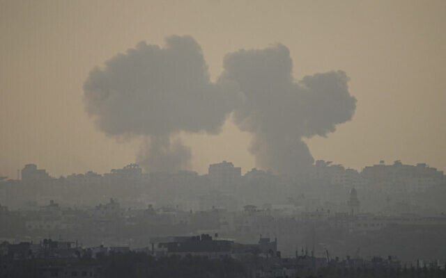 Smoke rises following an Israeli airstrike in the Gaza Strip, as seen from southern Israel, October 22, 2023. (AP Photo/Ariel Schalit)