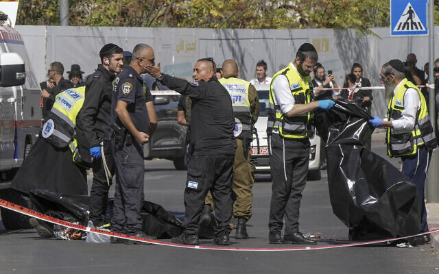 Police inspect the scene of a stabbing attack in Jerusalem, Monday, Oct. 30, 2023. (AP Photo/Mahmoud Illean)