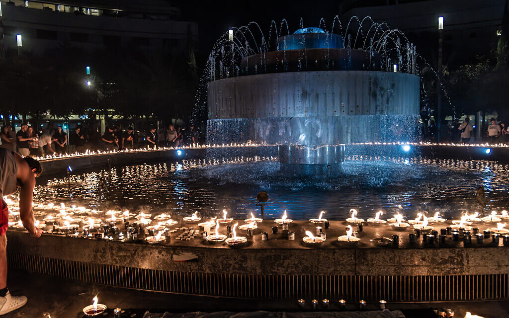 A scene from the 1300 Candle Vigil in Dizengoff Square in Tel Aviv, on October 12, 2023. (Eli Katzoff)