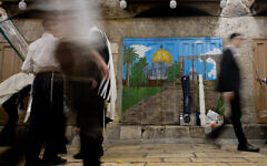 Illustrative: Jews walk in Jerusalem's Old City on October 1, 2023. (Chaim Goldberg/Flash90)